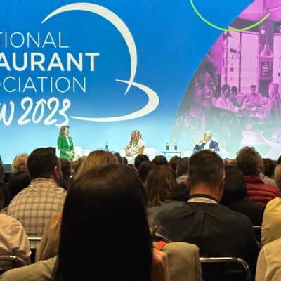 speaker on stage at 2023 restaurant show