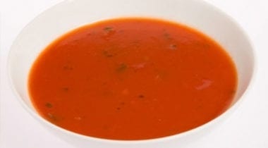 tomato soup in a white bowl