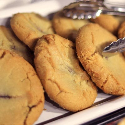 cookies on platter with tongs