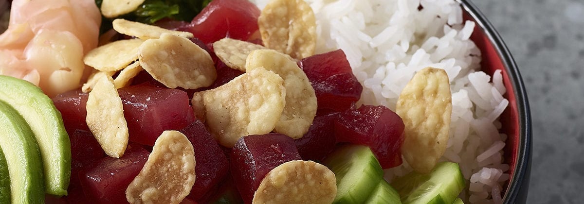 crispy garlic chips on sashimi salad