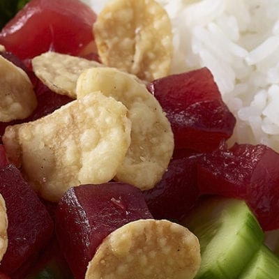 crispy garlic chips on sashimi salad