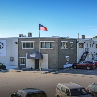 warehouse facility exterior with american flag