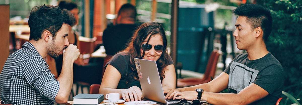 dining outdoors with a laptop