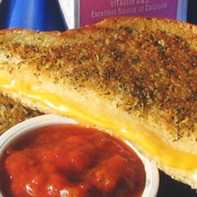 herb grilled cheese sandwich on school tray