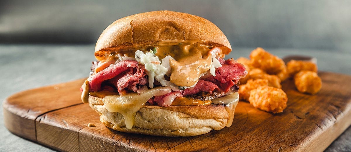 corned beef sandwich with slaw and kogi sauce