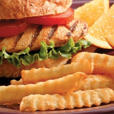 french fries and chicken sandwich lemon wedges