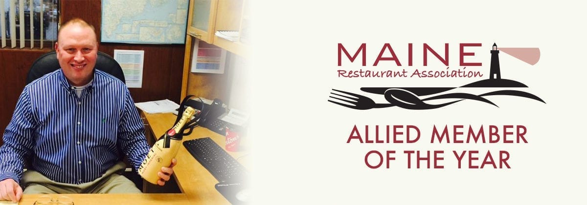 Maine Restaurant Association logo and man holding award