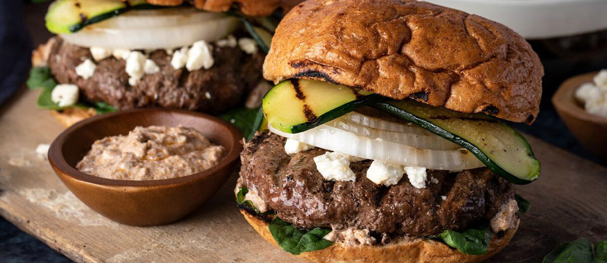 burger with grilled vegetables and onion