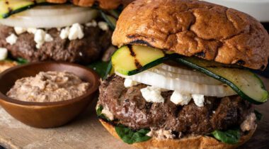 burger with grilled vegetables and onion