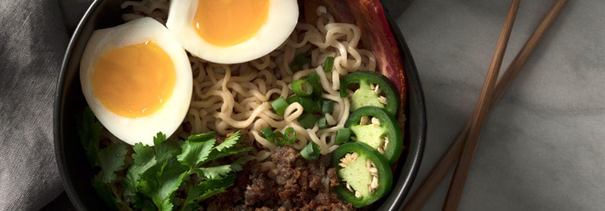 ramen bowl with jalapeno, beef, bacon and eggs