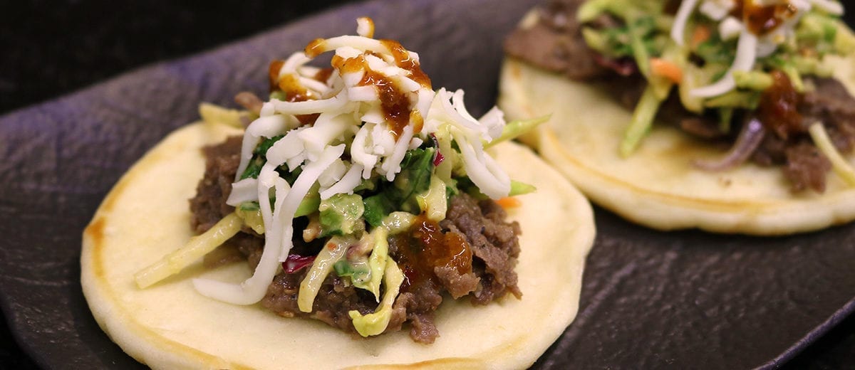 sesame beef with slaw on naan